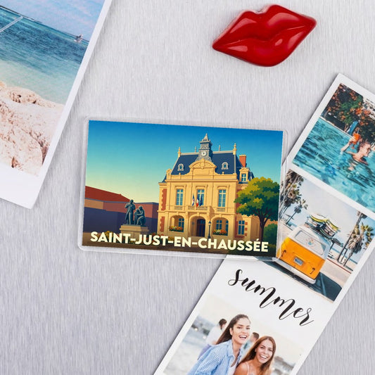 Magnet souvenir de la ville de Saint-Just-en-Chaussée avec une illustration stylisée de son hôtel de ville.