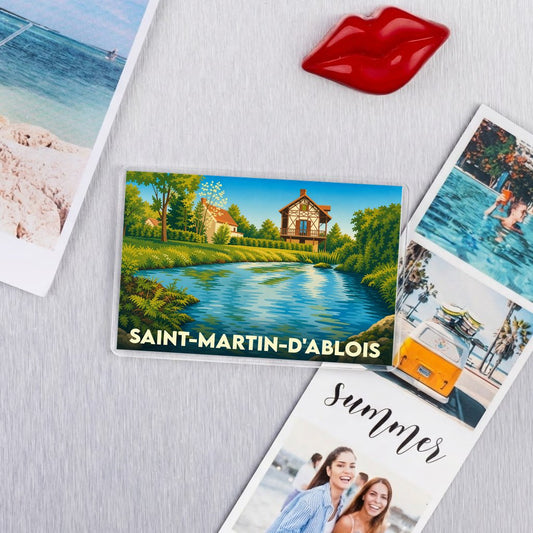 Magnet souvenir de la ville de Saint-Martin-d'Ablois avec une illustration stylisée d'un paysage champêtre.
