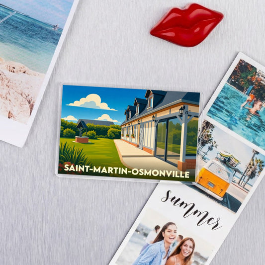 Magnet souvenir de la commune de Saint-Martin-Osmonville avec une illustration stylisée d'une maison traditionnelle et de son jardin.