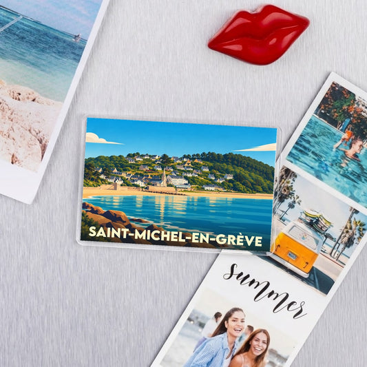 Magnet souvenir de la ville de Saint-Michel-en-Grève avec une illustration stylisée du bord de mer.