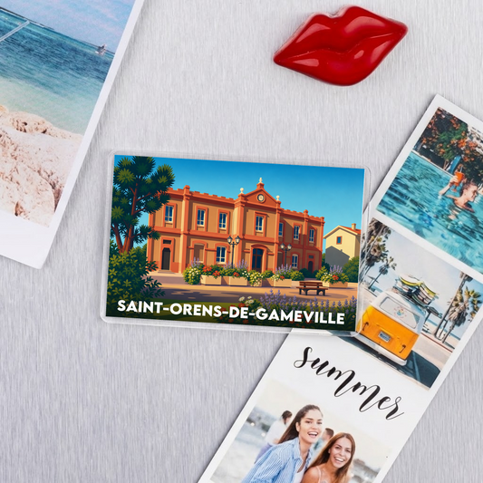 Magnet souvenir de la ville de Saint-Orens-de-Gameville avec une illustration stylisée.