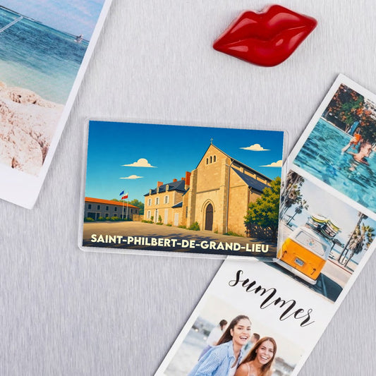 Magnet souvenir de Saint-Philbert-de-Grand-Lieu avec une illustration stylisée de son abbatiale historique.