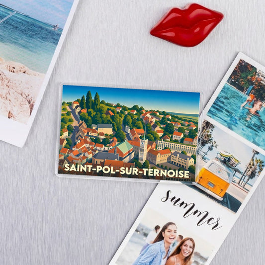 Magnet souvenir de la ville de Saint-Pol-sur-Ternoise avec une illustration stylisée d'un panorama urbain.