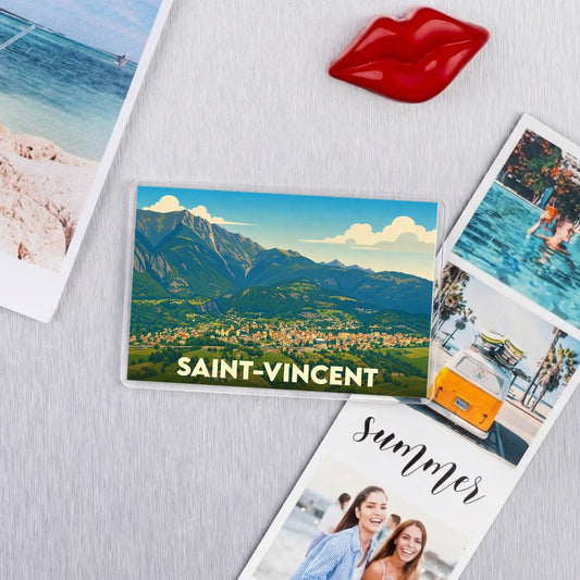 Magnet souvenir de la ville de Saint-Vincent avec une illustration stylisée d'un paysage montagneux.