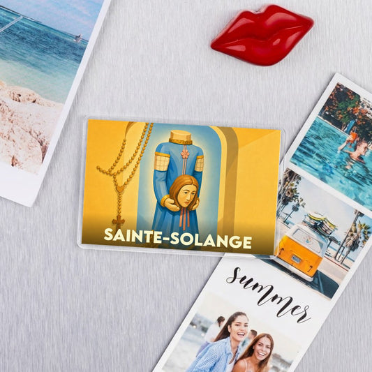 Magnet souvenir de la ville de Sainte-Solange avec une illustration stylisée.