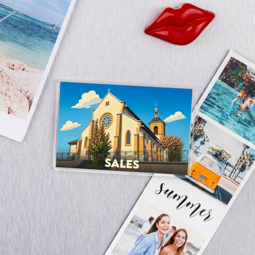 Magnet souvenir de la ville de Sales avec une illustration stylisée de son église.