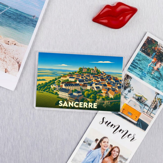 Magnet souvenir de la ville de Sancerre avec une illustration stylisée.