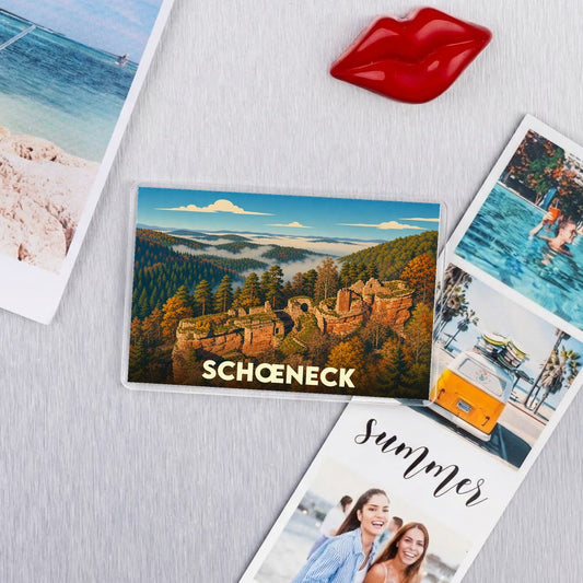 Magnet souvenir de la ville de Schœneck avec une illustration stylisée de ses ruines de château.