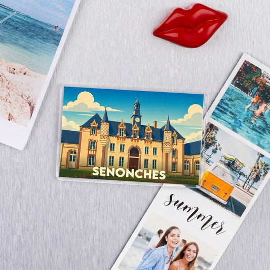 Magnet souvenir de la ville de Senonches avec une illustration stylisée de son château.
