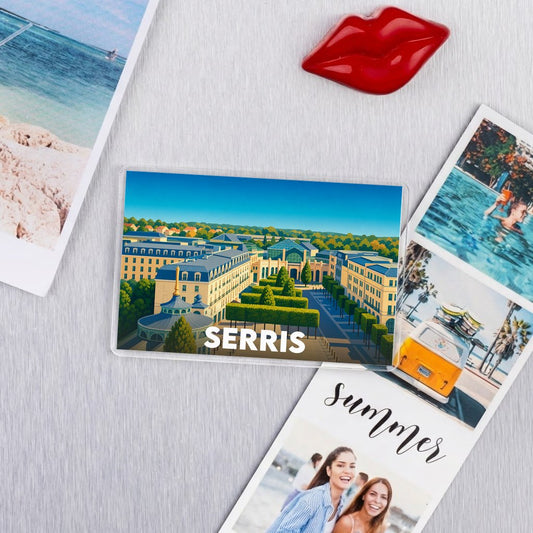 Magnet souvenir de la ville de Serris avec une illustration stylisée de son architecture.