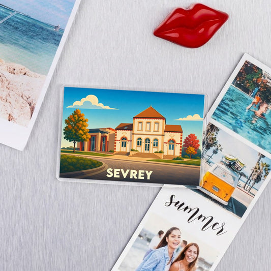 Magnet souvenir de la ville de Sevrey avec une illustration stylisée.