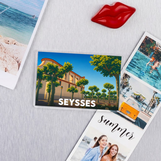 Magnet souvenir de la ville de Seysses avec une illustration stylisée.
