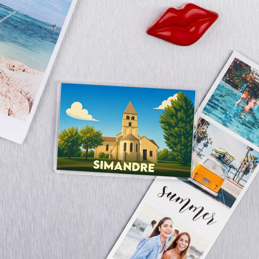 Magnet souvenir de la ville de Simandre avec une illustration stylisée de son église.