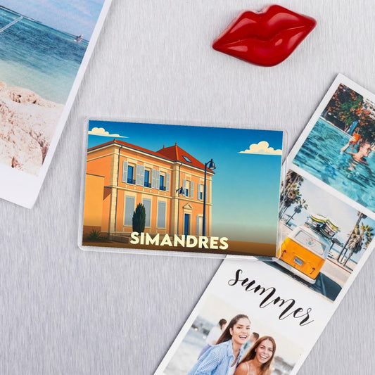 Magnet souvenir de la ville de Simandres avec une illustration stylisée d'un bâtiment local.