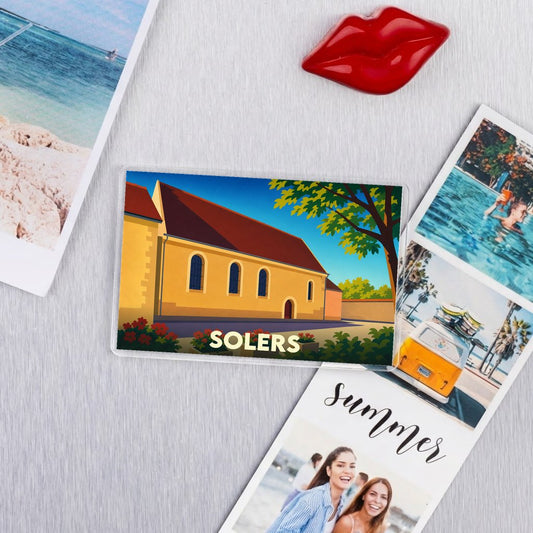 Magnet souvenir de la ville de Solers avec une illustration stylisée d'une église.