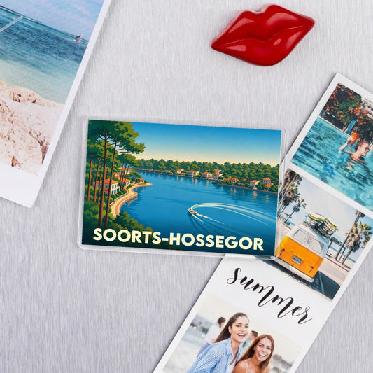 Magnet souvenir de la ville de Soorts-Hossegor avec une illustration stylisée du lac.