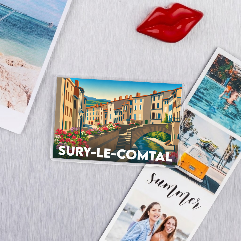 Magnet souvenir de la ville de Sury-le-Comtal avec une illustration stylisée et colorée.