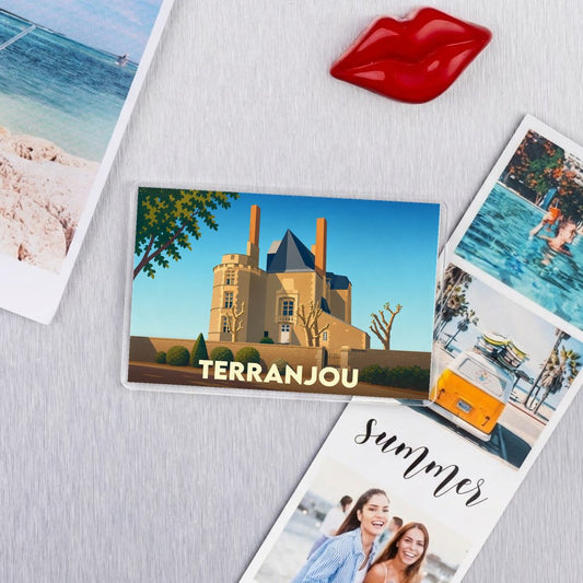 Magnet souvenir de la ville de Terranjou avec une illustration stylisée de son château.