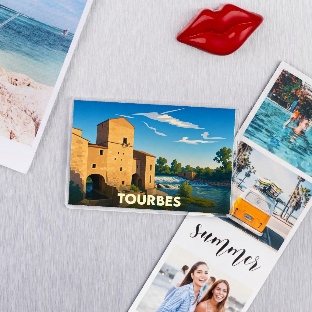 Magnet souvenir de la ville de Tourbes avec une illustration stylisée.