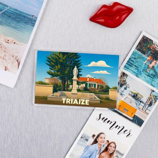 Magnet souvenir de la ville de Triaize avec une illustration stylisée.