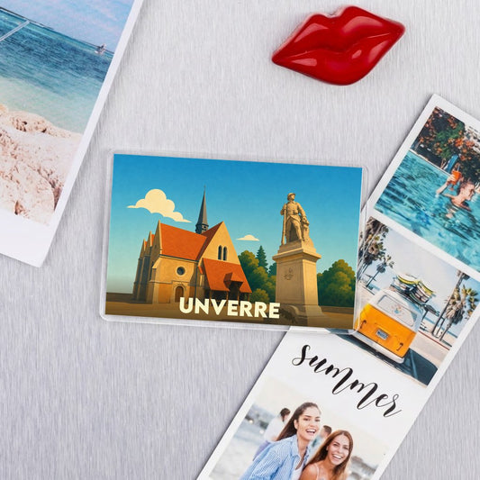 Magnet souvenir de la ville de Unverre avec une illustration stylisée d'une église et d'une statue.