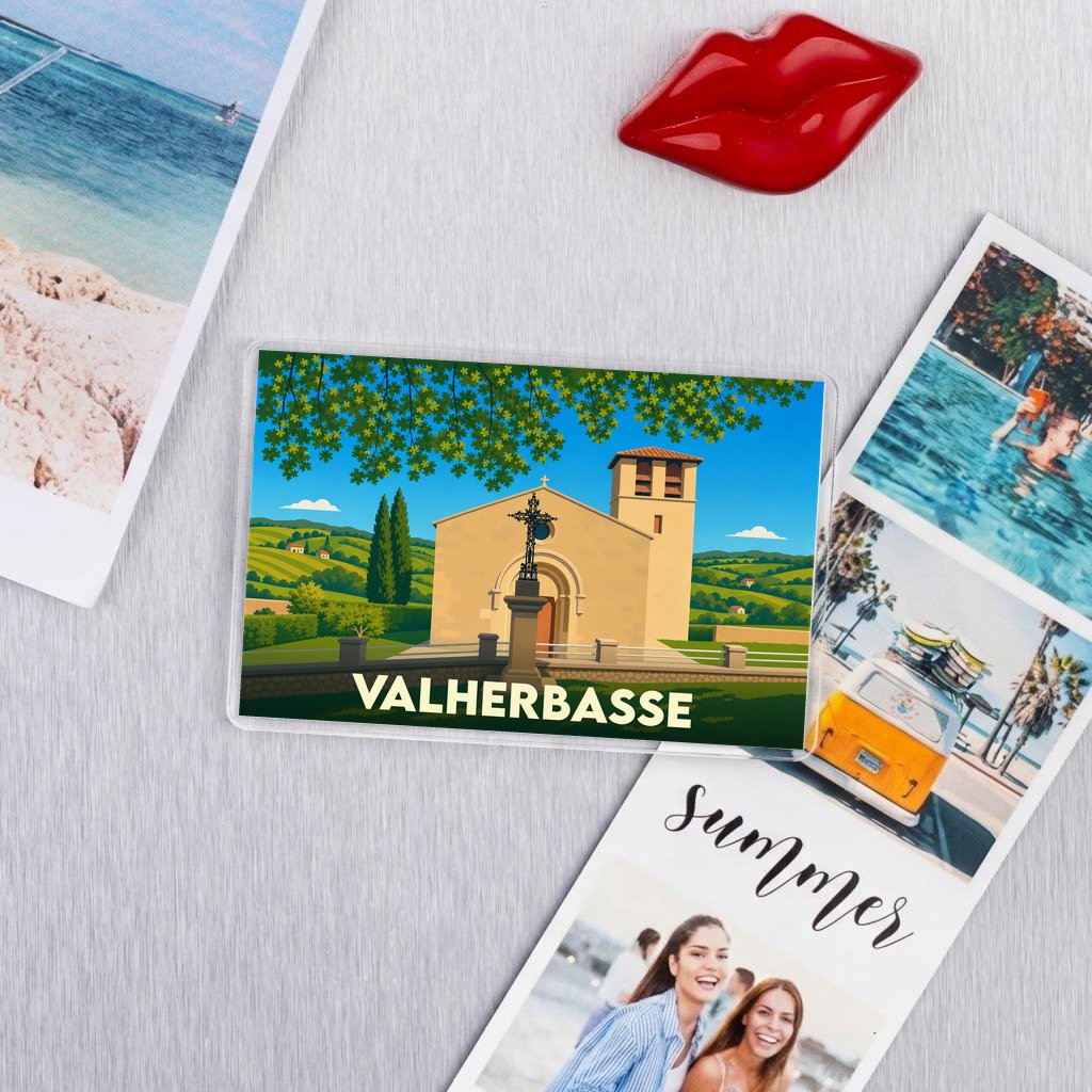 Magnet souvenir de la ville de Valherbasse avec une illustration stylisée.