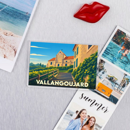 Magnet souvenir de la ville de Vallangoujard avec une illustration stylisée.