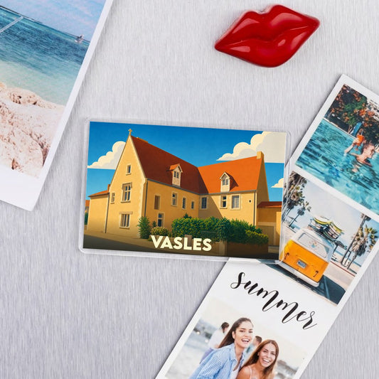 Magnet souvenir de la ville de Vasles avec une illustration stylisée.