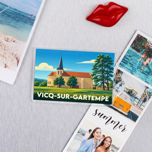 Magnet souvenir de la ville de Vicq-sur-Gartempe avec une illustration stylisée de son église.
