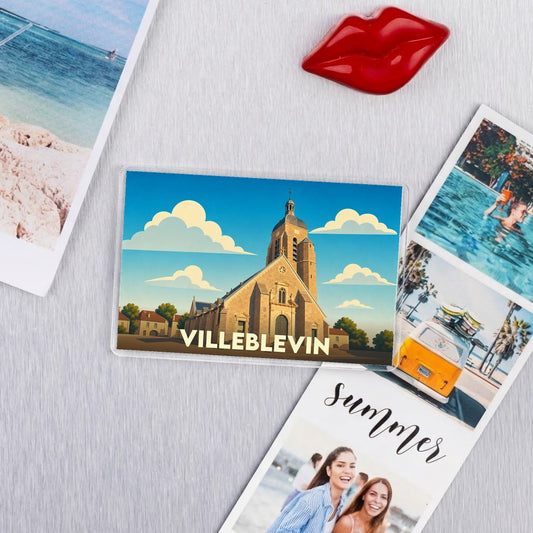 Magnet souvenir de la ville de Villeblevin avec une illustration stylisée de son église.