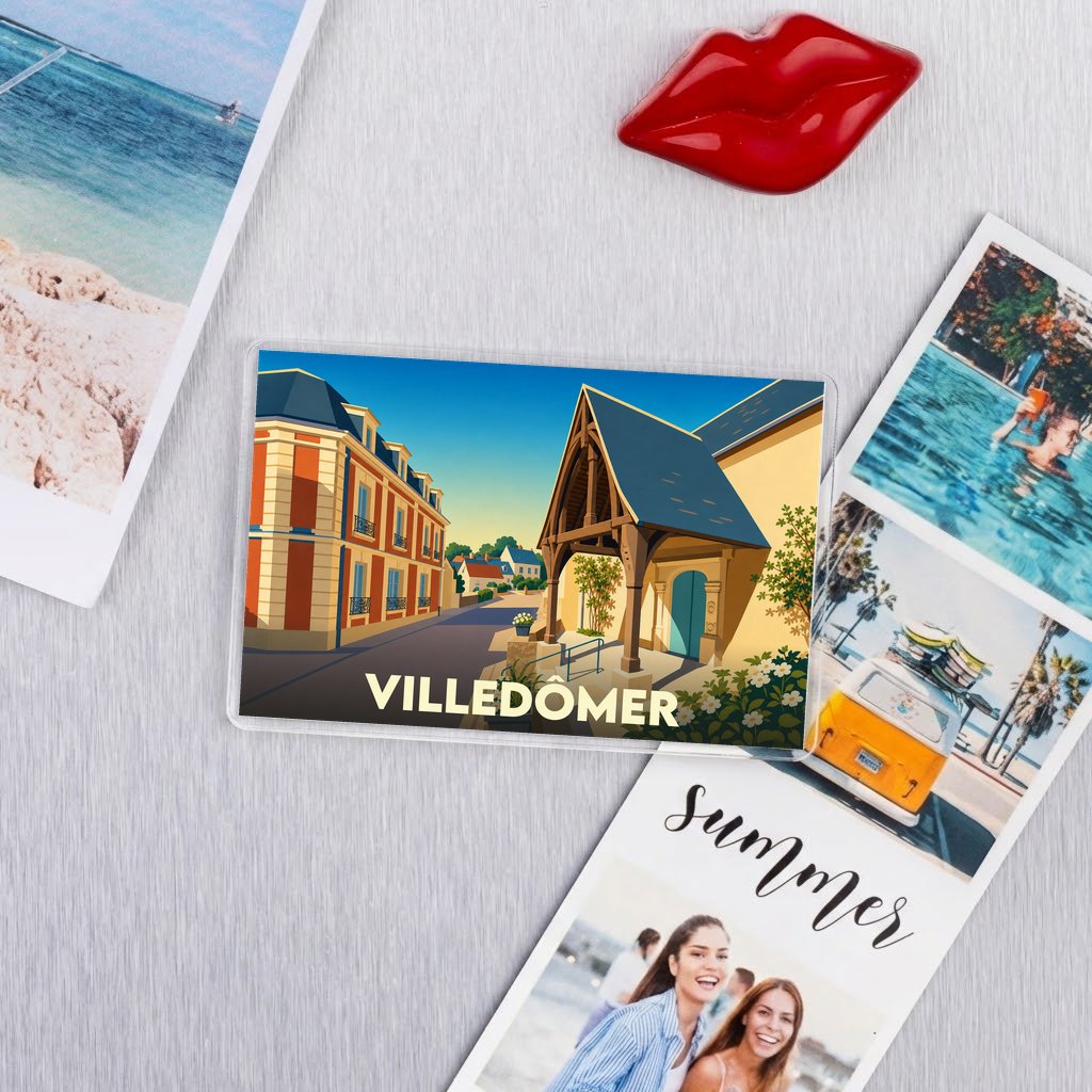 Magnet souvenir de la ville de Villedômer avec une illustration stylisée d'un bâtiment historique.
