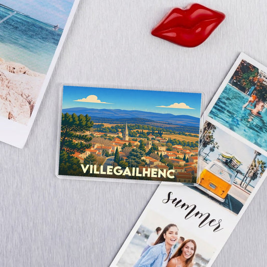 Magnet souvenir de la ville de Villegailhenc avec une illustration panoramique stylisée.