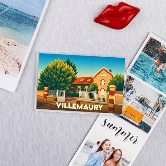 Magnet souvenir de la ville de Villemaury avec une illustration stylisée d'une maison de caractère.