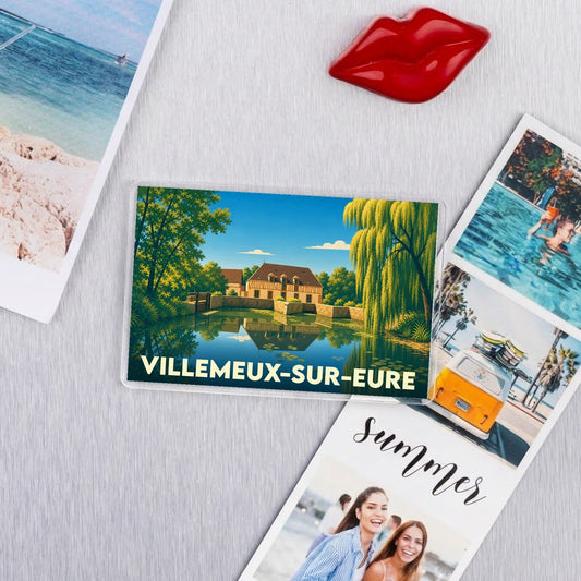 Magnet souvenir de la ville de Villemeux-sur-Eure avec une illustration stylisée d'un moulin au bord de l'eau.