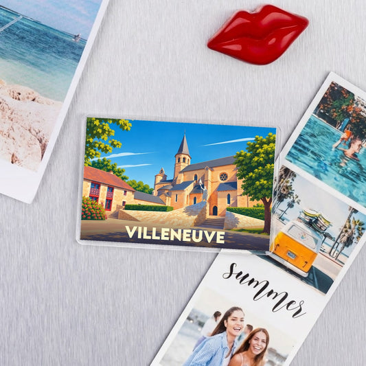 Magnet souvenir de la ville de Villeneuve avec une illustration stylisée de son église médiévale.