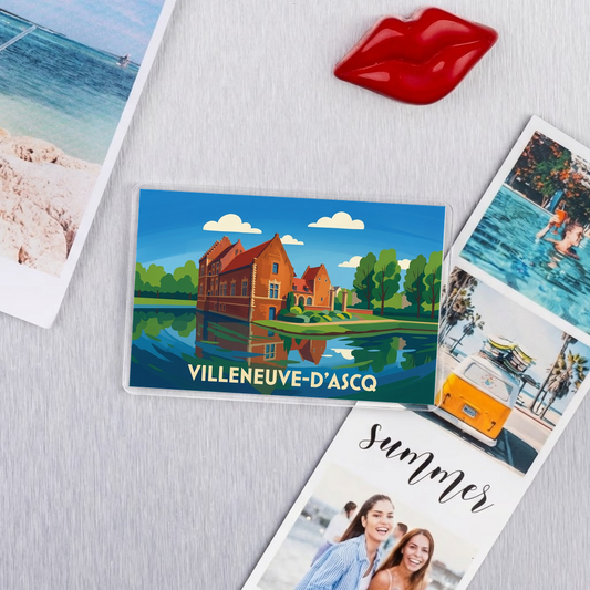 Magnet souvenir de la ville de Villeneuve-d'Ascq avec une illustration stylisée d'un château au bord de l'eau.