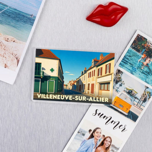 Magnet souvenir de la ville de Villeneuve-sur-Allier avec une illustration stylisée.