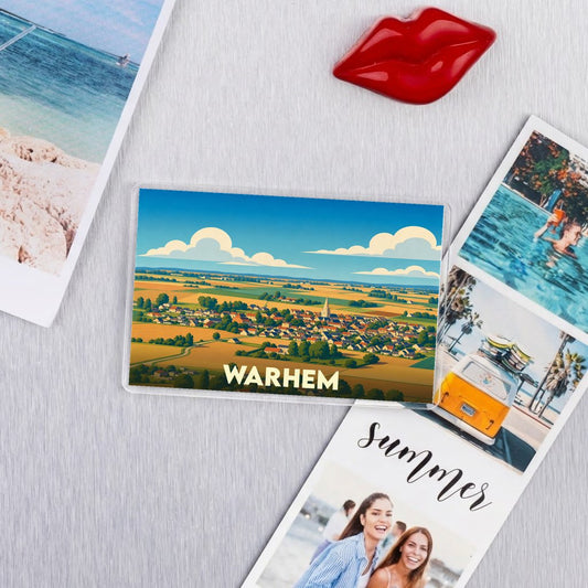 Magnet souvenir de la ville de Warhem avec une illustration panoramique stylisée.