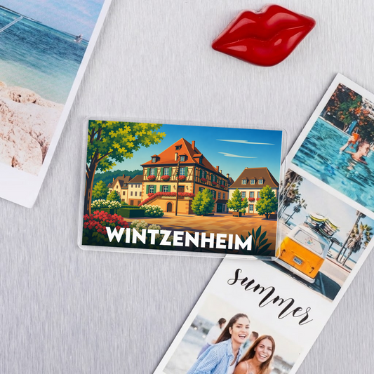 Magnat souvenir de la ville de Wintzenheim avec une illustration stylisée de maisons traditionnelles alsaciennes.