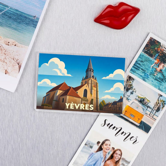 Magnet souvenir de la ville de Yèvres avec une illustration stylisée de son église.