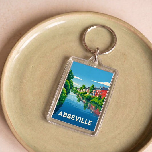 Porte-clés souvenir de la ville d'Abbeville avec une illustration stylisée.
