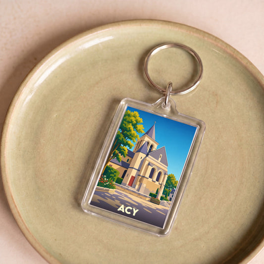 Porte-clés souvenir de la ville d'Acy avec une illustration stylisée de son église.
