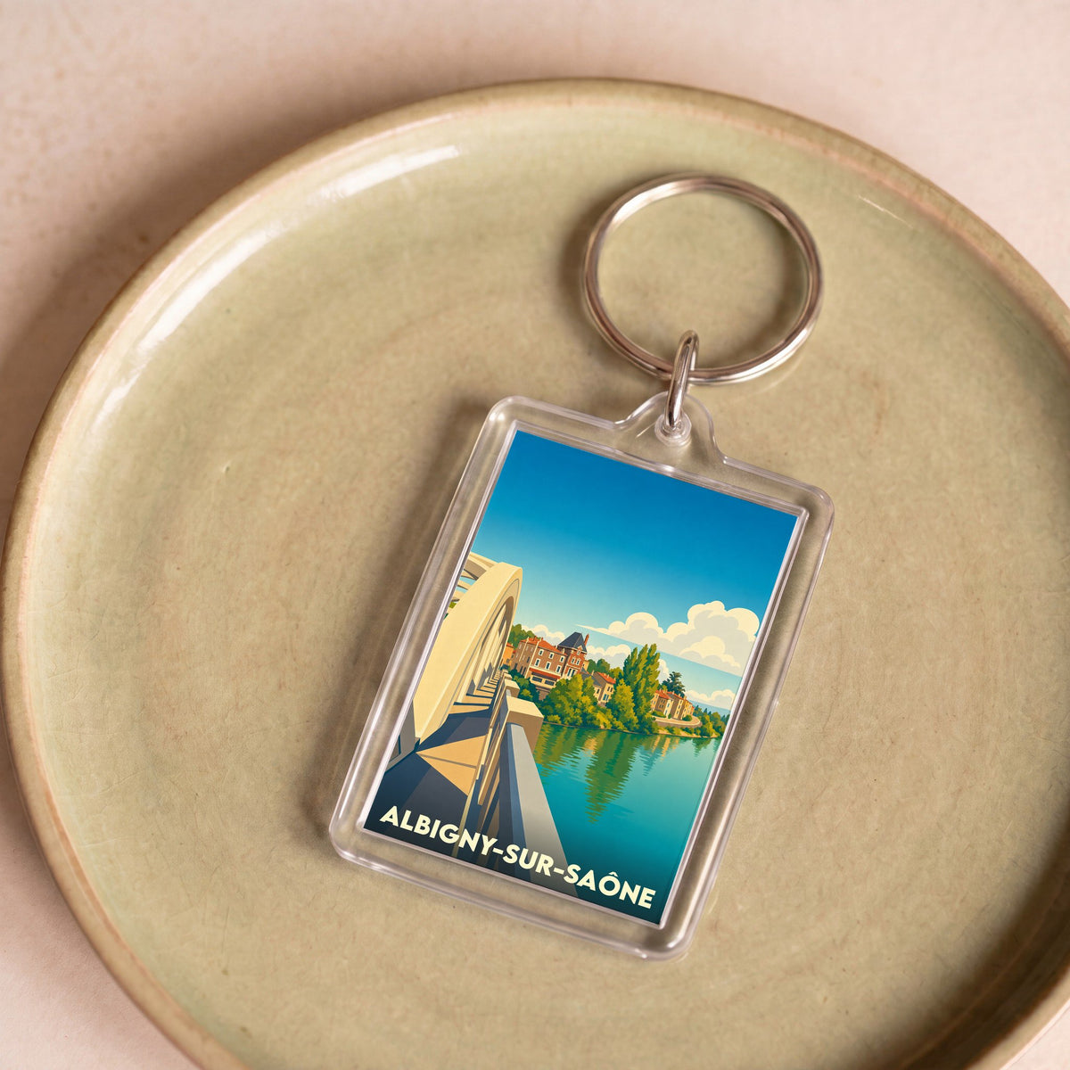 Porte-clés souvenir de la ville d'Albigny-sur-Saône avec une illustration stylisée.