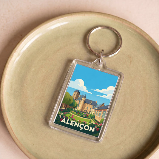 Porte-clés souvenir de la ville d'Alençon avec une illustration stylisée.