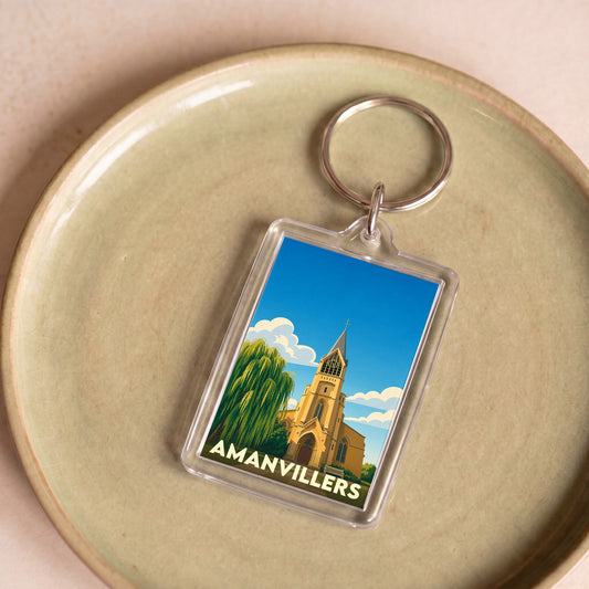 Porte-clés souvenir de la ville d'Amanvillers avec une illustration stylisée de son église.