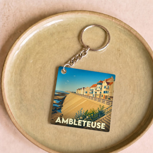 Porte-clés souvenir de la ville de Ambleteuse avec une illustration stylisée du front de mer.
