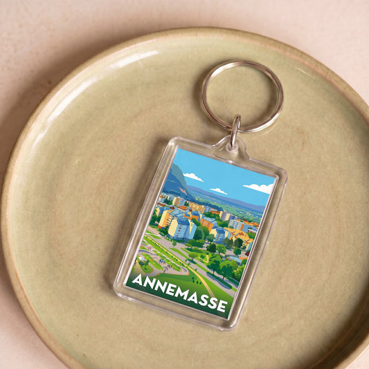 Porte-clés souvenir de la ville d'Annemasse avec une illustration stylisée.