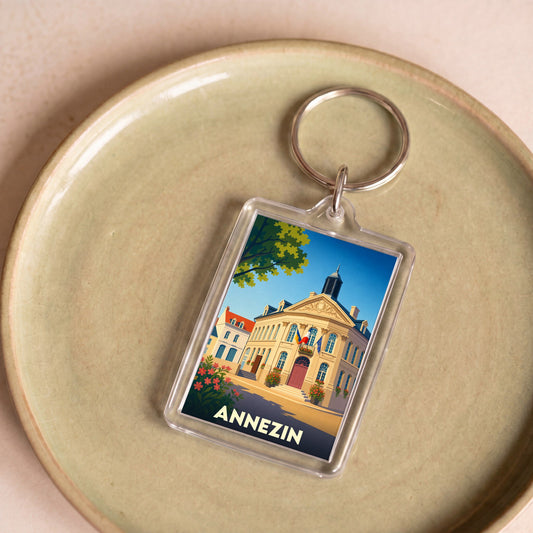 Porte-clés souvenir de la ville d'Annezin avec une illustration stylisée de l'hôtel de ville.