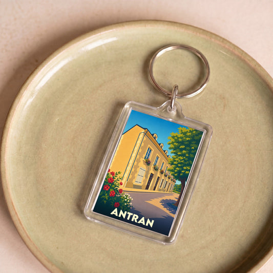 Porte-clés souvenir de la ville de Antran avec une illustration stylisée.