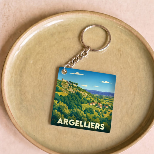 Porte-clés souvenir de la ville d'Argelliers avec une illustration stylisée de son paysage vallonné.